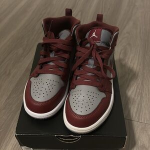 Burgundy and grey Jordans 1 mid size 1 boys youth.